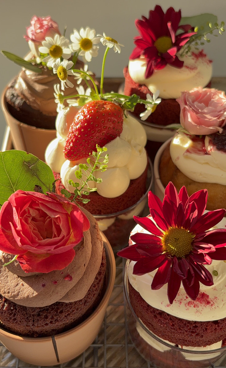 mini cakes with flowers decorated on top