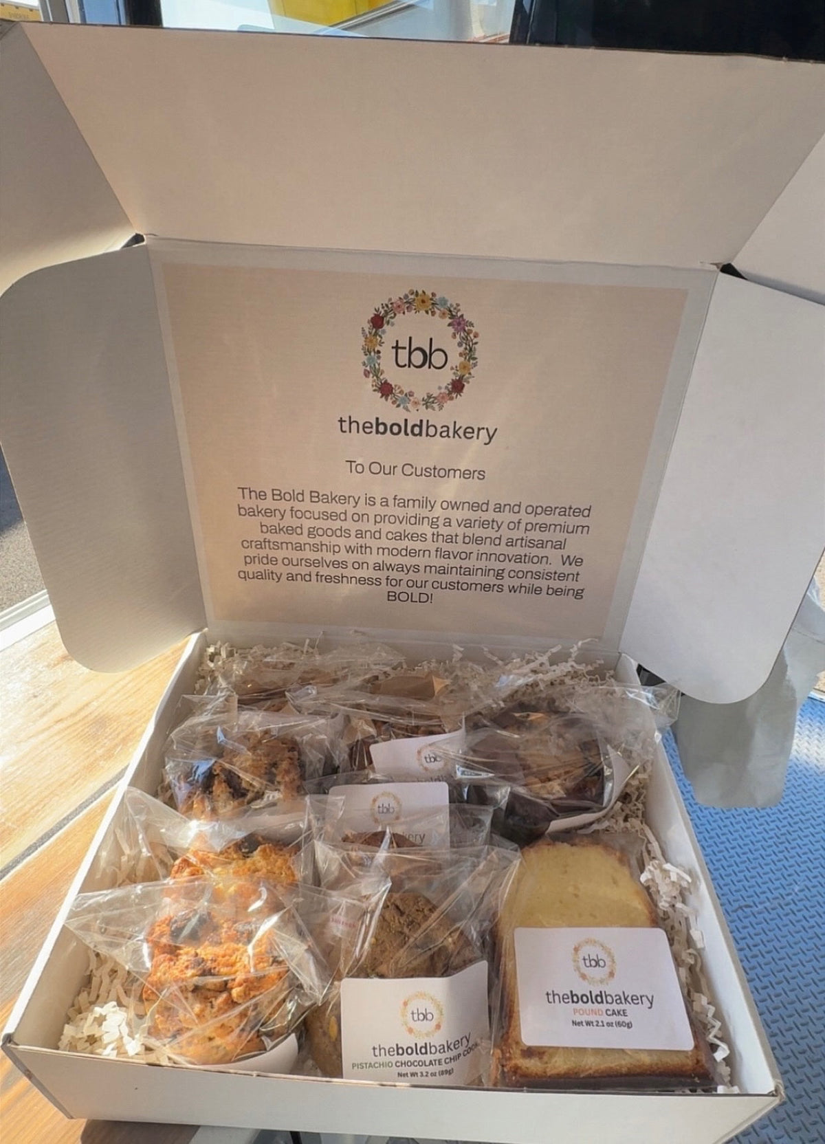Half Dozen Breakfast Box - 1 Blueberry Muffin, 1 Banana Bread Slice, 1 Blueberry Lemon Biscone, 1 Chocolate Cherry Biscone, 1 Chocolate Chip Cookie, 1 Chocolate Chip Pistachio Cookie